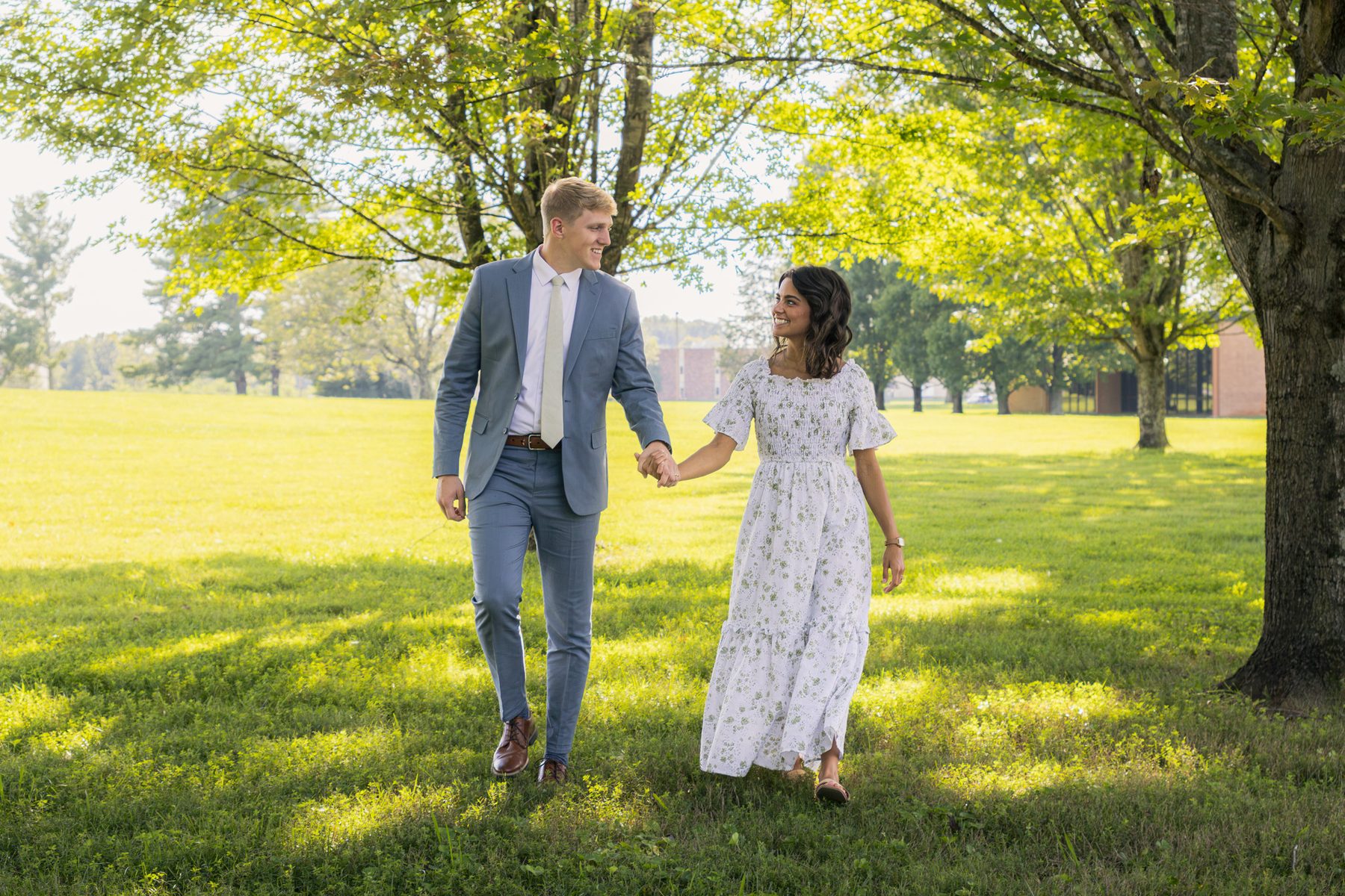 AJ & Bethany Horton walking together outdoors